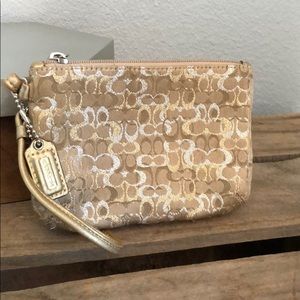 ✨SALE✨ 3/$20 Coach tan cloth wristlet